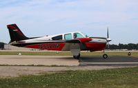 N332HP @ KOSH - Beech F33A - by Mark Pasqualino