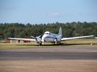 G-OPLC @ EGHH - across apron shot in heat haze - by magnaman