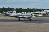 N7180V @ EGHH - Taxiing to depart European Avn - by John Coates