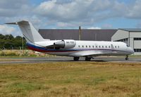 9H-YOU @ EGHH - Taxiing to depart - by John Coates