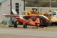 C-GXCS @ CYPZ - Parked by airport maintenance shed. Shot from Highway 16. - by Remi Farvacque