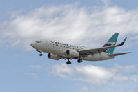 C-FWCN @ CYVR - Landing - by Guy Pambrun