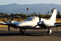 N223X @ KRHV - New locally based Piper Seneca parked on the transient ramp while awaiting for new tie down permit at Reid Hillview Airport, San Jose, CA. - by Chris Leipelt