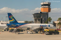 N533NK @ MMSD - Parked in front of main terminal building. - by Remi Farvacque