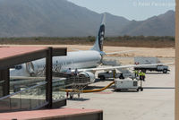 N302AS @ MMSD - Rampside chat by pilots. In front of main terminal building. - by Remi Farvacque