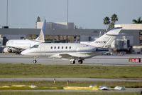 N840TM @ PBI - taxiing at PBI - by Bruce H. Solov