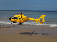 G-HEMN - East Anglia Air Ambulance landing on Cromer Beach to airlift a youngster with a head injury - by m0sjv