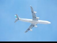 9K-ANC @ EGLL - Flying over Surrey whilst on approach to Heathrow.
