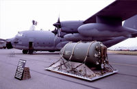 64-0561 @ EGVA - US Air Force on static display at RIAT, the rather large bomb would be pushed out of the Hercules to clear trees for a helicopter to rescue downed pilots. - by kenvidkid