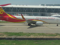B-6063 @ ZSPD - taxying past us as we taxi out - by magnaman