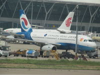 B-6248 @ ZSPD - on remote stand as we taxy by - by magnaman
