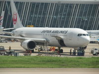 JA609J @ ZSPD - on stand at PVG - by magnaman