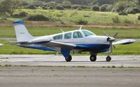 N2299L @ EGFH - Visiting Bonanza. - by Roger Winser