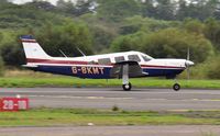 G-BKMT @ EGFH - Resident Saratoga SP departing Runway 28. - by Roger Winser