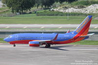 N402WN @ KTPA - Southwest Flight 588 (N402WN) taxis for departure at Tampa International Airport prior to flight to Louisville International Airport - by Donten Photography