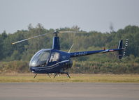 G-DOGI @ EGLK - Robinson R22 Beta at Blackbushe. Ex N 2363S - by moxy