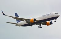 TF-ISN @ EHAM - B-767 seconds from touching down at the Polderbaan - by Paul H