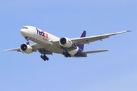N853FD @ LFPG - Boeing 777-FS2, Short approach rwy 27R, Roissy Charles De Gaulle Airport (LFPG-CDG) - by Yves-Q