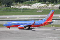 N554WN @ KTPA - Southwest Flight 133 (N554WN) taxis at Tampa International Airport prior to flight to Birmingham-Shuttlesworth International Airport - by Donten Photography