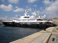 M-ARIZ - Luxury motor yacht in Dockyard Creek, Malta (name is possibly QLF or QLR - you decide from the picture!) with Eurocopter M-ARIZ on stern landing pad. - by Neil Henry