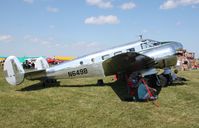 N649B @ KOSH - Beech D18S