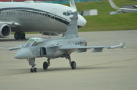 39277 @ EGLF - Saab Gripen taxis out for validation flight - by Syed Rasheed