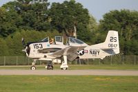 N757K @ KOSH - North American T-28C - by Mark Pasqualino