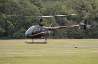 G-EERY @ EGKR - Robinson R22 Beta II at Redhill. - by moxy