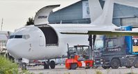 M-MOVE @ EGHH - Unloading and showing its new internal titles - by John Coates