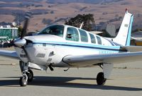 N8263V @ E16 - KiloMonkey LLC (Davis, CA) 1990 Beechcraft B36TC Bonanza taxing in at South County Airport, San Martin, CA. - by Chris Leipelt