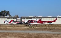 N541FA @ E16 - USDA Forest Service (Irvine, CA) Bell UH-1H preparing for departure at South County Airport, San Martin, CA. - by Chris Leipelt