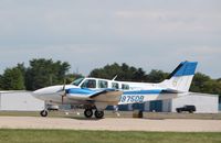 N875DB @ KOSH - Beech 58 - by Mark Pasqualino