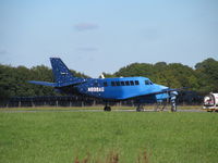 N899AG @ EGTU - the sun makes this very smart - by magnaman