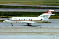 OY-BDS @ EGLL - Dassault Falcon 20C [180] (Danfoss Aviation) Heathrow~G @ 26/01/1977. From a slide not the best of shots. - by Ray Barber