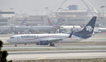 XA-AMN @ KLAX - Arriving at LAX on a foggy morning - by Todd Royer