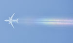 JA824J @ KLAX - Flying over LAX on its way to San Diego - by Todd Royer