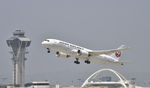 JA828J @ KLAX - Departing LAX - by Todd Royer