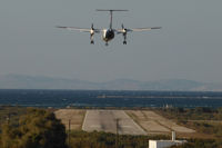 SX-BIR @ LGNX - Olympic Dash 8-200 short final at Naxos Airport - by Stefan Mager