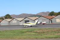 N7787N @ SZP - 1969 Piper PA-28-180 CHEROKEE, Lycoming O&VO-360 180 Hp, landing roll Rwy 22 - by Doug Robertson