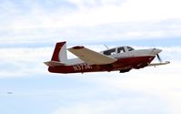 N3774H @ KRHV - Locally-based 1979 Mooney M20J departing with SJC traffic in the background at Reid Hillview Airport, San Jose, CA. - by Chris Leipelt
