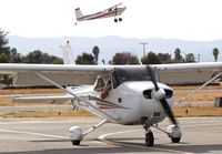 N5290E @ KRHV - Locally-based 2002 Cessna 172S clear of 31R at Reid Hillview Airport, San Jose, CA. - by Chris Leipelt