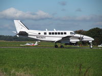 N4381Y @ EGTU - para dropper - by magnaman