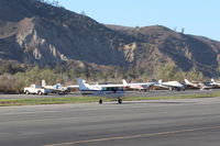 N704UT @ SZP - 1976 Cessna 150M, Continental O-200 100 Hp, landing roll Rwy 22 - by Doug Robertson