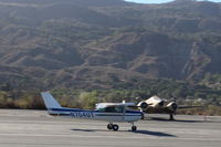 N704UT @ SZP - 1976 Cessna 150M, Continental O-200 100 Hp, landing roll Rwy 22 - by Doug Robertson