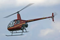 G-OCOV @ EGFH - R22 Beta 2, Heli Air Wales Swansea based, low pass runway 22. - by Derek Flewin