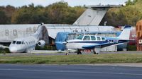 2-LOVE @ EGHH - Taxiing past the fire dump - by John Coates