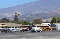 N59031 - 1941 Boeing Stearman A75N1, Continental W670 220 Hp radial, refueling from truck - by Doug Robertson