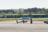 N100FH @ KAWO - Getting tied down. Parked in front of main terminal building. - by Remi Farvacque