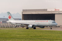 C-GIUB @ CYVR - Parked by Jazz (Air Canada) maintenance hangar.
