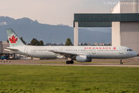 C-GIUB @ CYVR - Parked by Jazz (Air Canada) maintenance hangar.